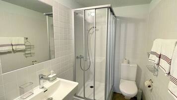 Shower, free toiletries, hair dryer, towels