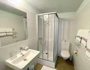 Shower, free toiletries, hair dryer, towels