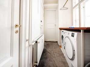 Convenient laundry facilities are available in this room.