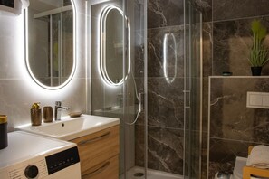 Hair dryer, towels, soap, toilet paper