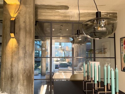 Stunning Industrial-Style Loft by the Canals