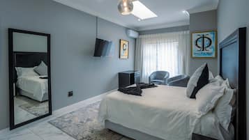 11 quartos, cofres nos quartos, ferros/tábuas de passar roupa