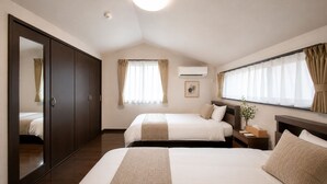 A hotel room with two beds, a wardrobe, a bedside table, an air conditioning unit, and a window with curtains. - yuuga (Tokyo)