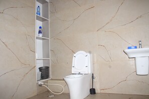 Shower, bidet, towels, soap