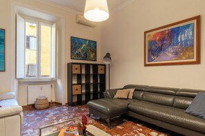 Apartment, 3 Bedrooms, 2 Bathrooms | Living area | Flat-screen TV - JOIVY Charming 3BR Flat near the Vatican (Rome)