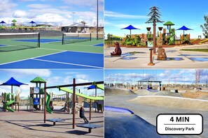 Enjoy recreational activities in this outdoor space featuring a tennis court, playground, and skate park.