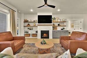 Smart TV, fireplace, video games, foosball