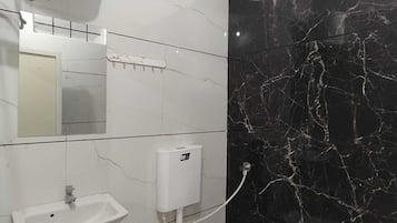 Comfort Double Room | Bathroom | Shower, slippers, soap, shampoo