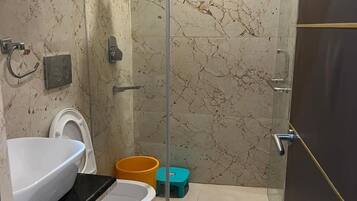 Shower, towels, soap, shampoo