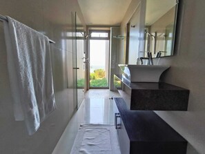 Comfort Studio, Ocean View | Bathroom | Towels, soap, shampoo, toilet paper