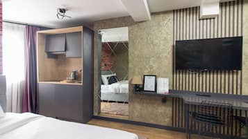 Habitación superior | Ropa de cama de alta calidad y escritorio