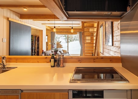 Luxury House, Mountain View | Private kitchen. Creekside Chalets Hakuba