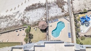 Pool - Spacious beachfront condo w/  lagoon-style pool, BBQ & direct beach access! (Orange Beach)