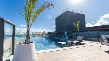 Outdoor pool, pool umbrellas, pool loungers