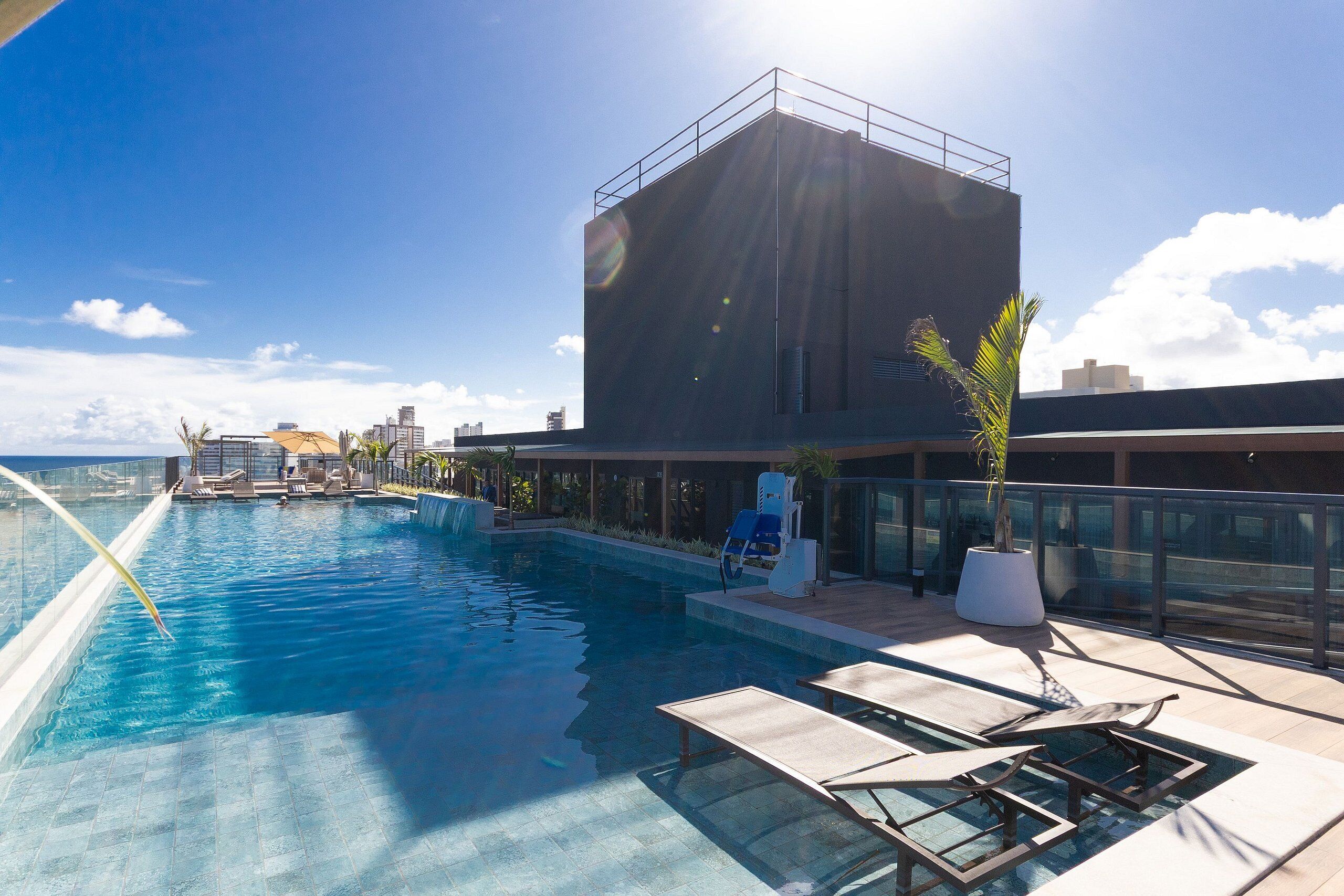 Outdoor pool, pool umbrellas, sun loungers