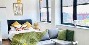 1 bedroom, desk, iron/ironing board, travel crib