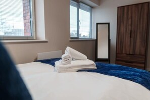 1 bedroom, desk, iron/ironing board, travel cot