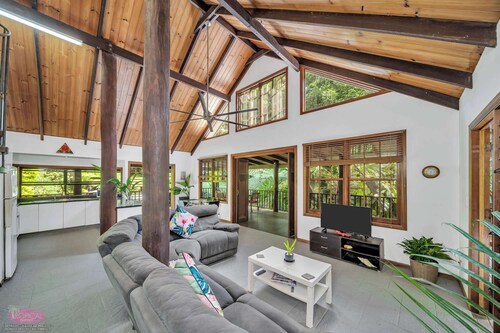 Fern House ~ your serene rainforest retreat.