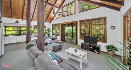 Fern House ~ your serene rainforest retreat.