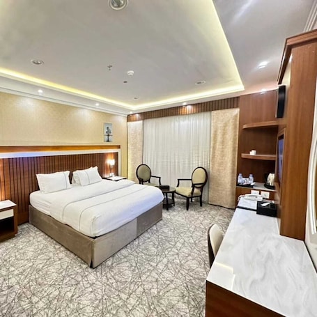 In-room safe, desk, laptop workspace, blackout curtains. Hyatt town 1