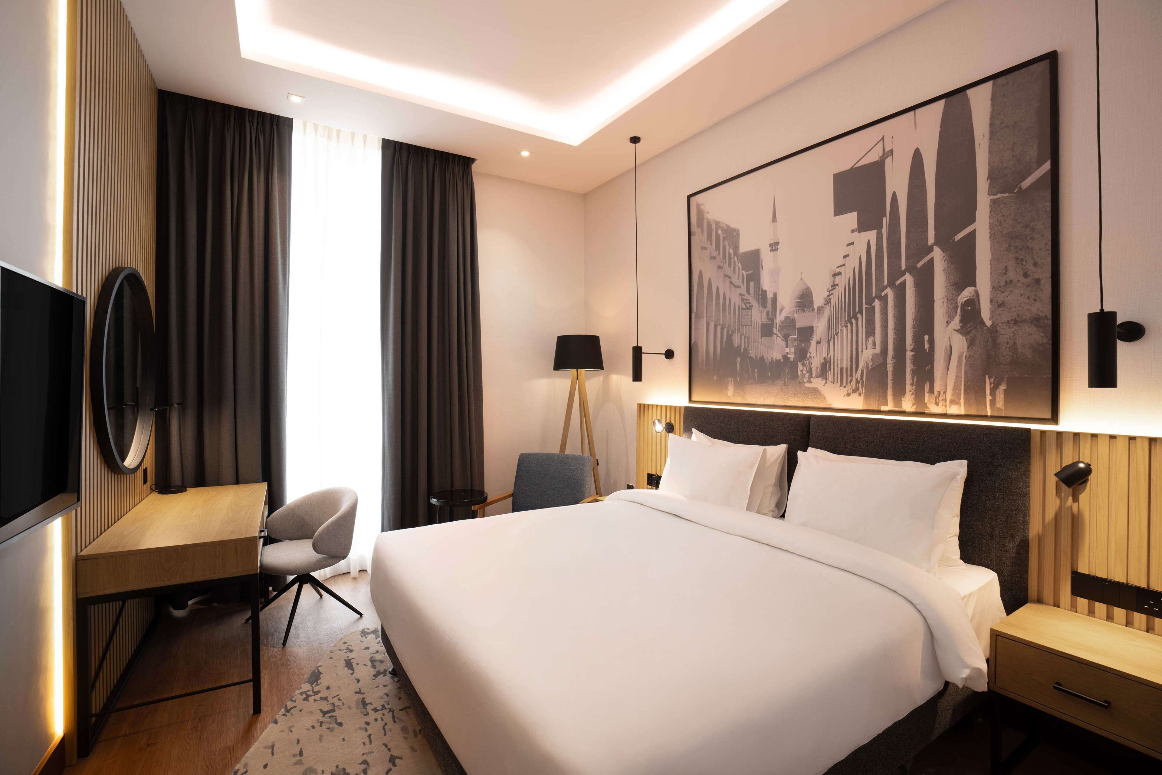 Egyptian cotton sheets, premium bedding, minibar, in-room safe