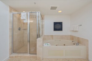 Shower, jetted tub, towels
