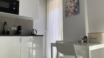 Panoramic Studio, 1 King Bed, Mountain View | Living area | 32-inch Smart TV with digital channels, heated floors