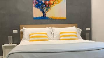 Frette Italian sheets, premium bedding, down duvets, memory-foam beds
