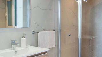 Shower, free toiletries, towels, soap