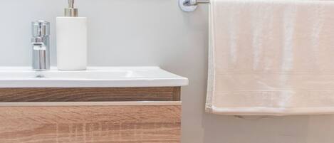 Shower, free toiletries, towels, soap