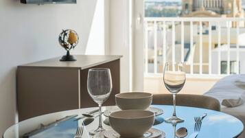 Desk, laptop workspace, blackout curtains, iron/ironing board