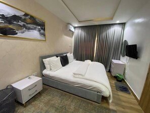 Family Apartment, Balcony, City View | 1 bedroom, in-room safe, desk, laptop workspace - El-Mak Luxury Homes (Enugu)