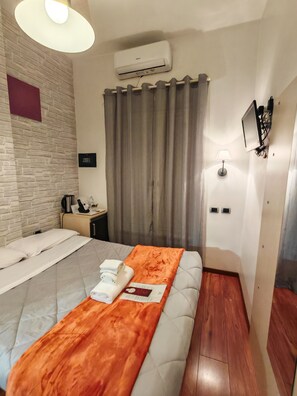 Economy kamer | Een kluis op de kamer, een strijkplank/strijkijzer, gratis wifi