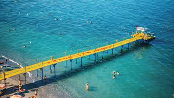 Private beach, white sand, beach umbrellas, beach towels