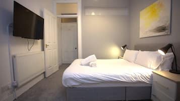 2 habitaciones, tabla de planchar con plancha, cuna de viaje y wifi
