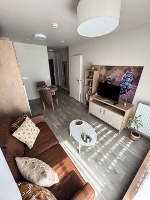 Apartment, 1 Bedroom | Living area | 32-inch TV with digital channels - Zenao Appart'hôtels Cenon (Cenon)