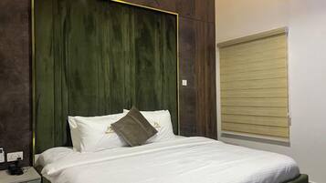 Luxury Apartment, Balcony, City View | 1 bedroom, desk, laptop workspace, blackout drapes