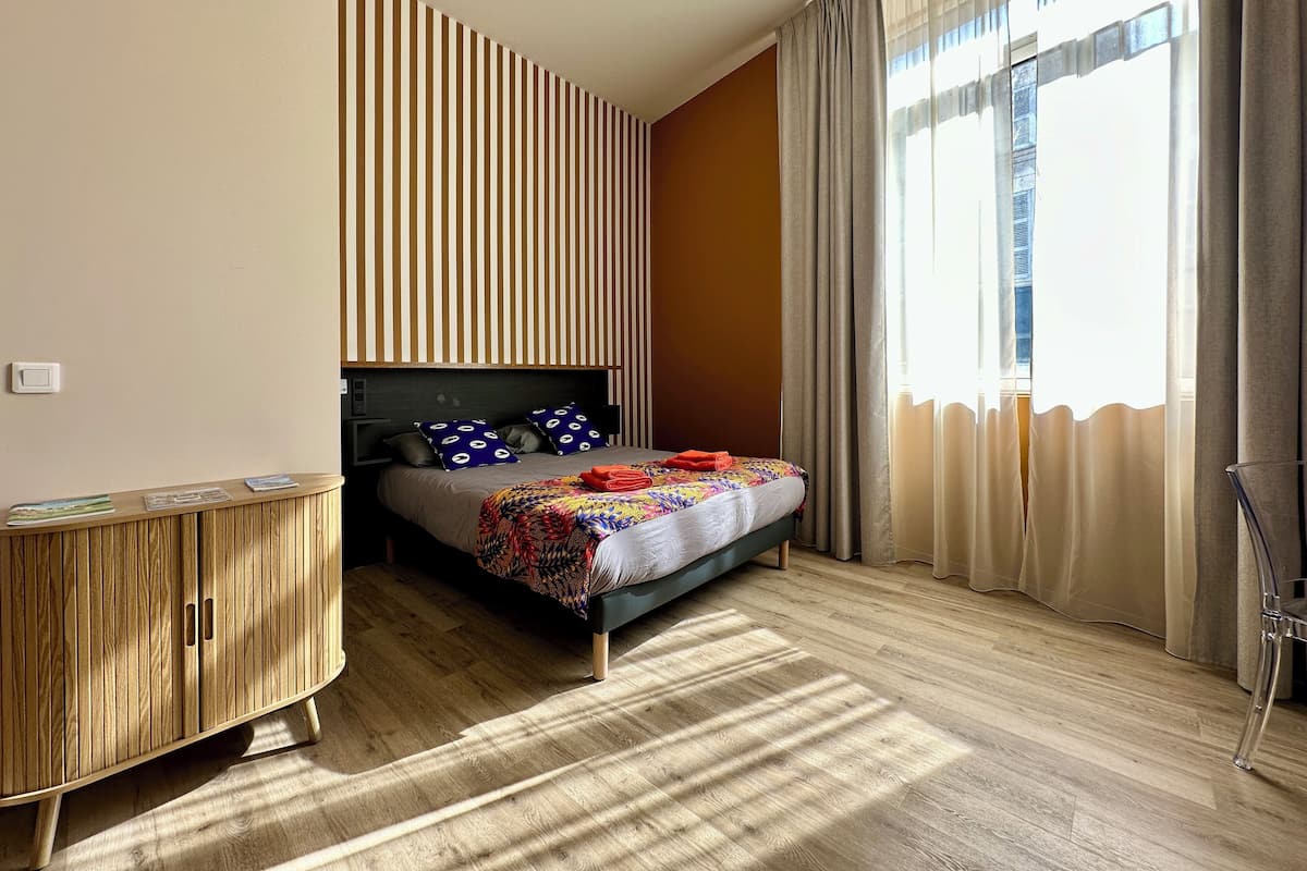 Premium Studio | 1 bedroom, blackout drapes, iron/ironing board, free WiFi