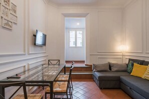 Standard Apartment | Living area | 43-inch Smart TV with digital channels