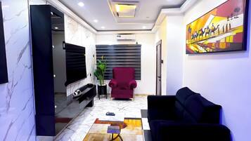 Deluxe Apartment, Balcony, City View | 1 bedroom, desk, laptop workspace, blackout drapes