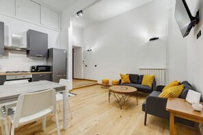 Apartment, 3 Bedrooms, Non Smoking | Living area | 32-inch flat-screen TV with digital channels