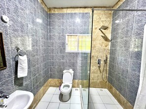 Shower, eco-friendly toiletries, hair dryer, bidet
