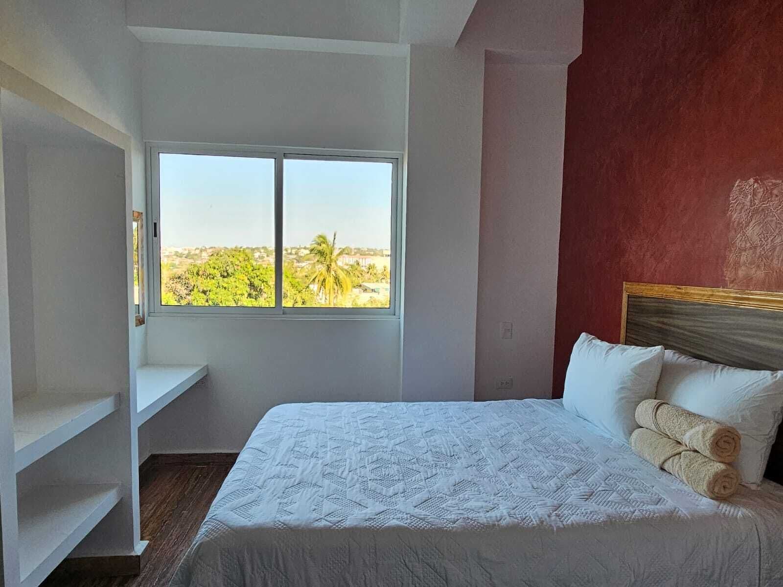 Habitación individual estándar, vista parcial al mar | Espacio para trabajar con laptop y wifi gratis 