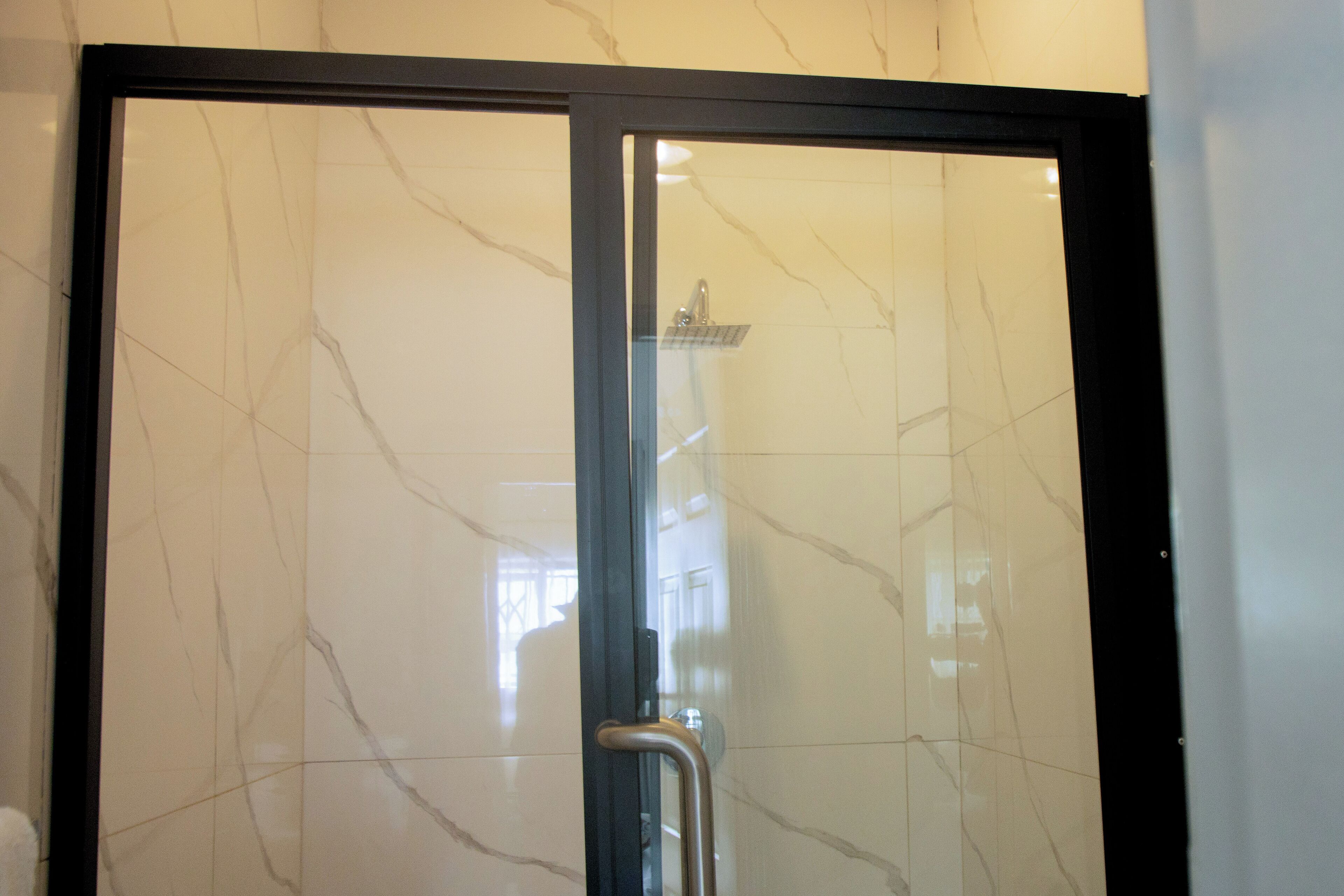 Shower, eco-friendly toiletries, hair dryer, towels