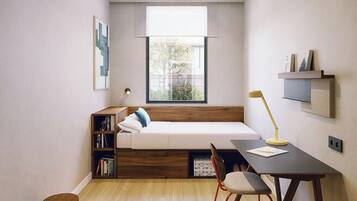 Escriptori, espai de treball apte per a portàtils i wifi gratuïta