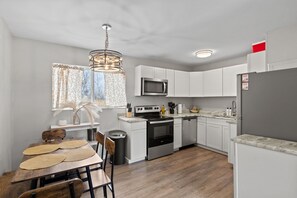 Fridge, microwave, dishwasher, coffee/tea maker