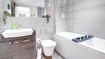 Apartment | Bathroom | Separate tub and shower, deep soaking tub, towels, toilet paper