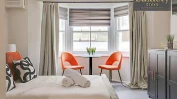 1 dormitorio, tabla de planchar con plancha, cuna de viaje y wifi gratis