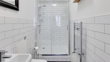 Hair dryer, towels, soap, shampoo