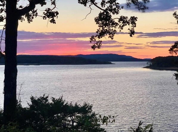 Surrounded by lush foliage and serene waters, this tranquil lakeside setting offers breathtaking views and a connection with nature.